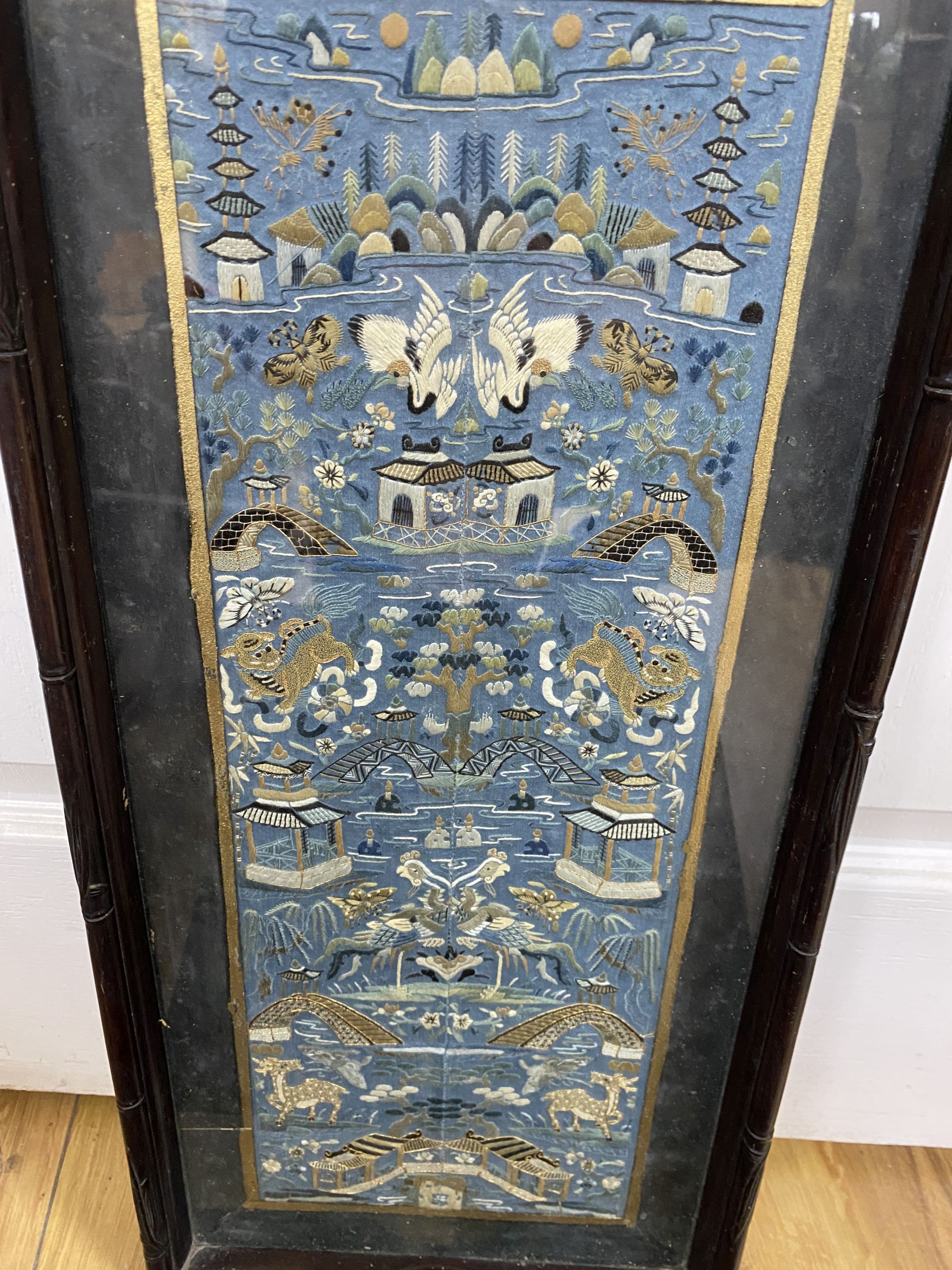 Two trays inset with Chinese embroidered silk panels, largest 53 x 23cm